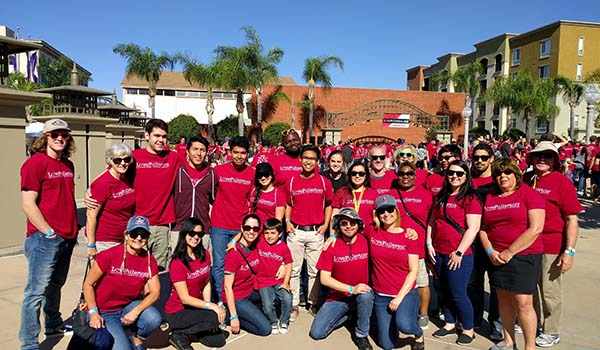 Group of students and staff working during Love Fullerton